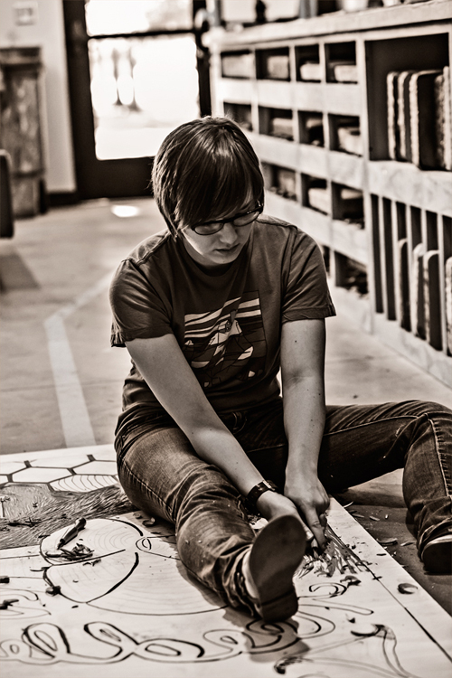 Student working on woodcut