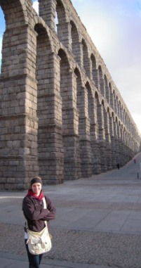 Student in front of an aqueduct in Spain