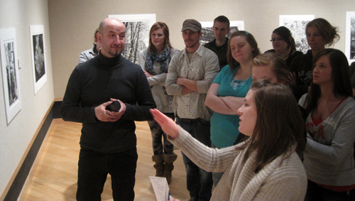Michael Goro meets with art majors in the gallery
