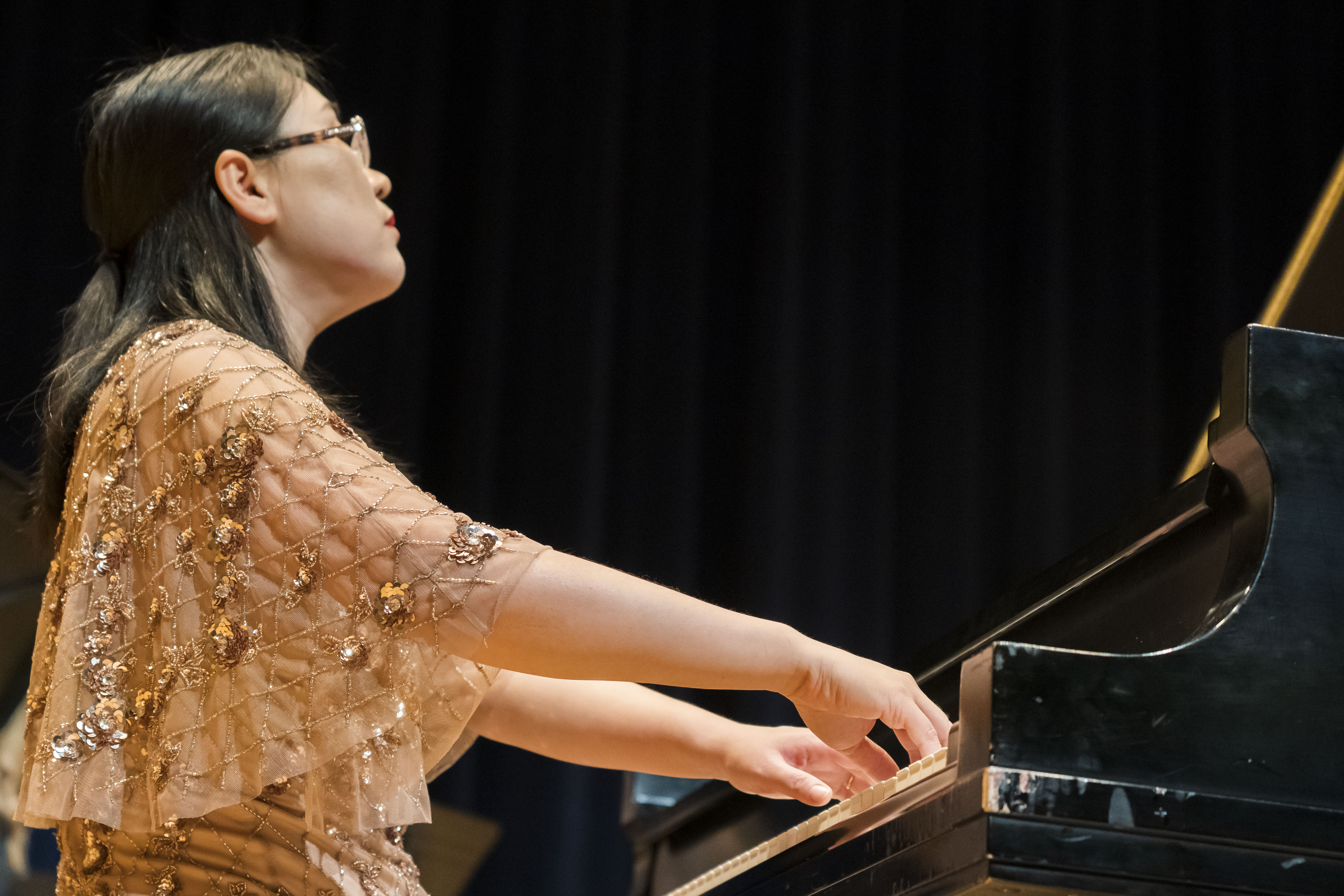 Dr. Shu Li Playing Piano