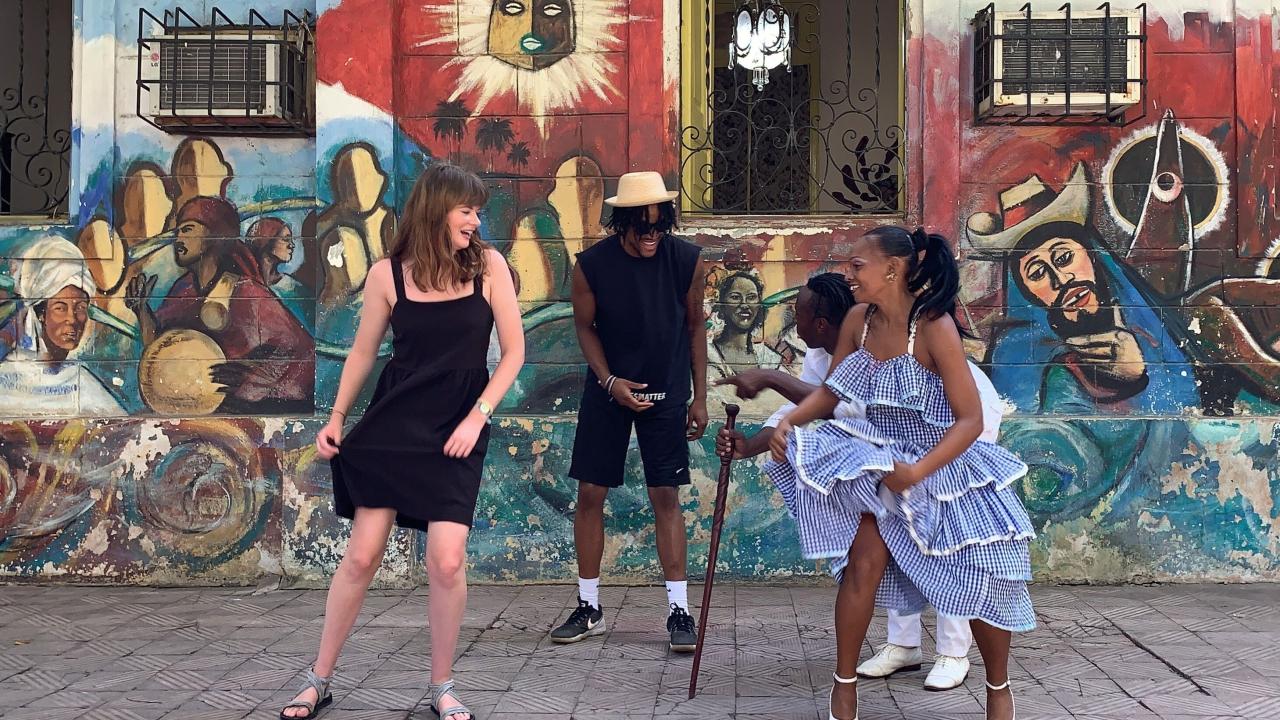 women dancing in the street