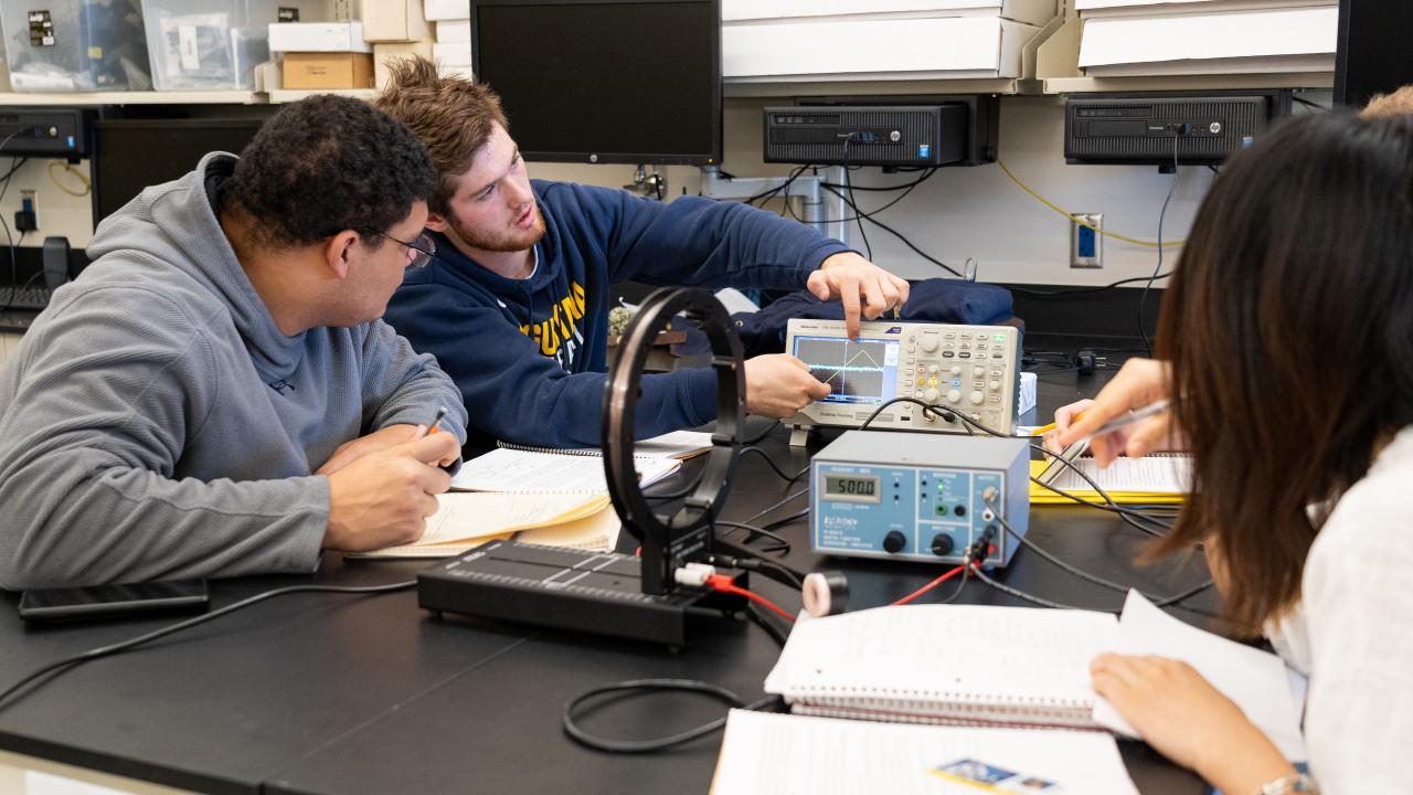students in physics lab