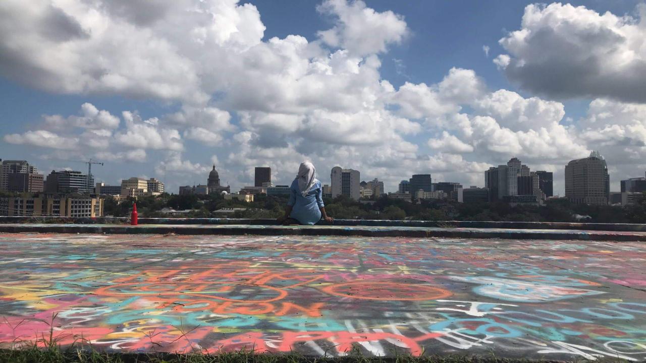 student looking at cityscape