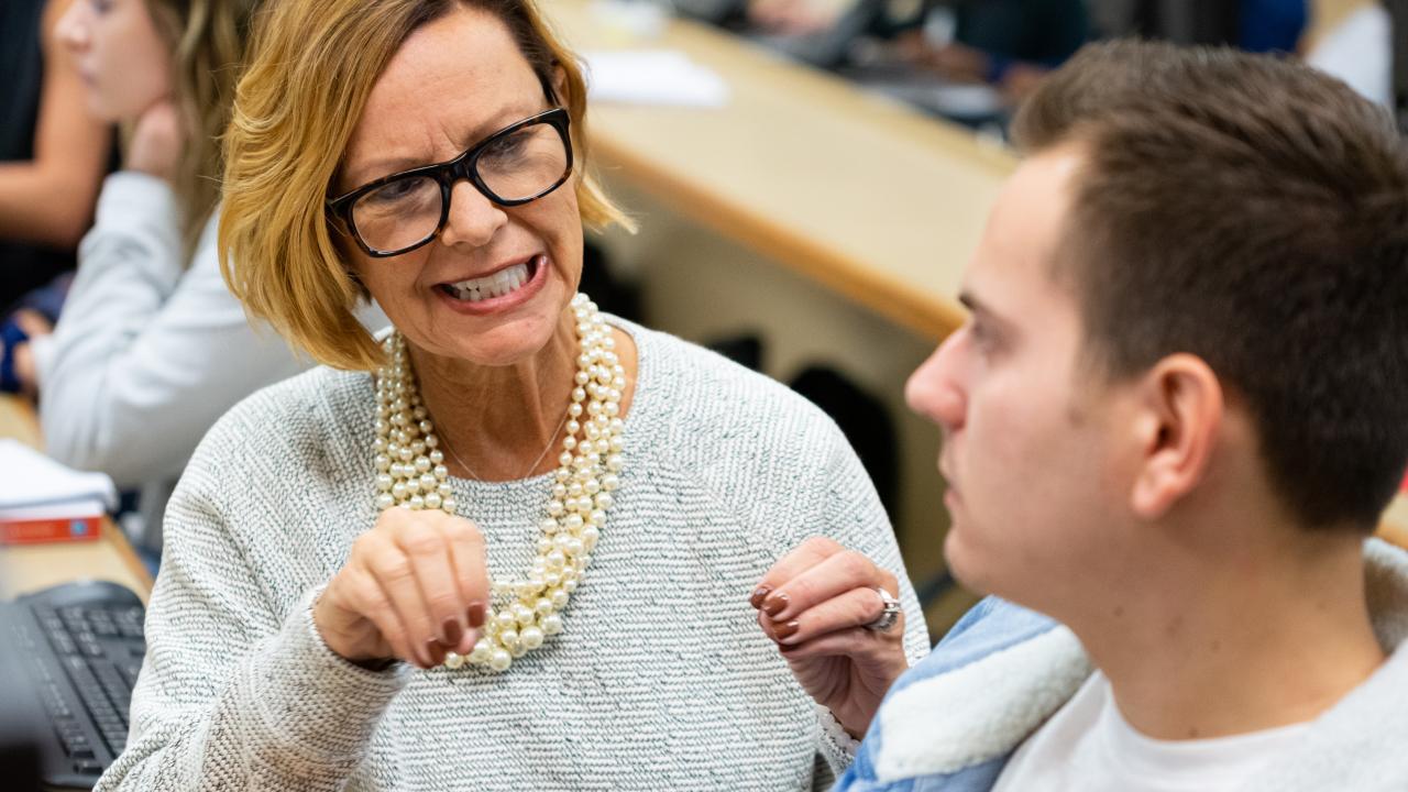 professor talking to student