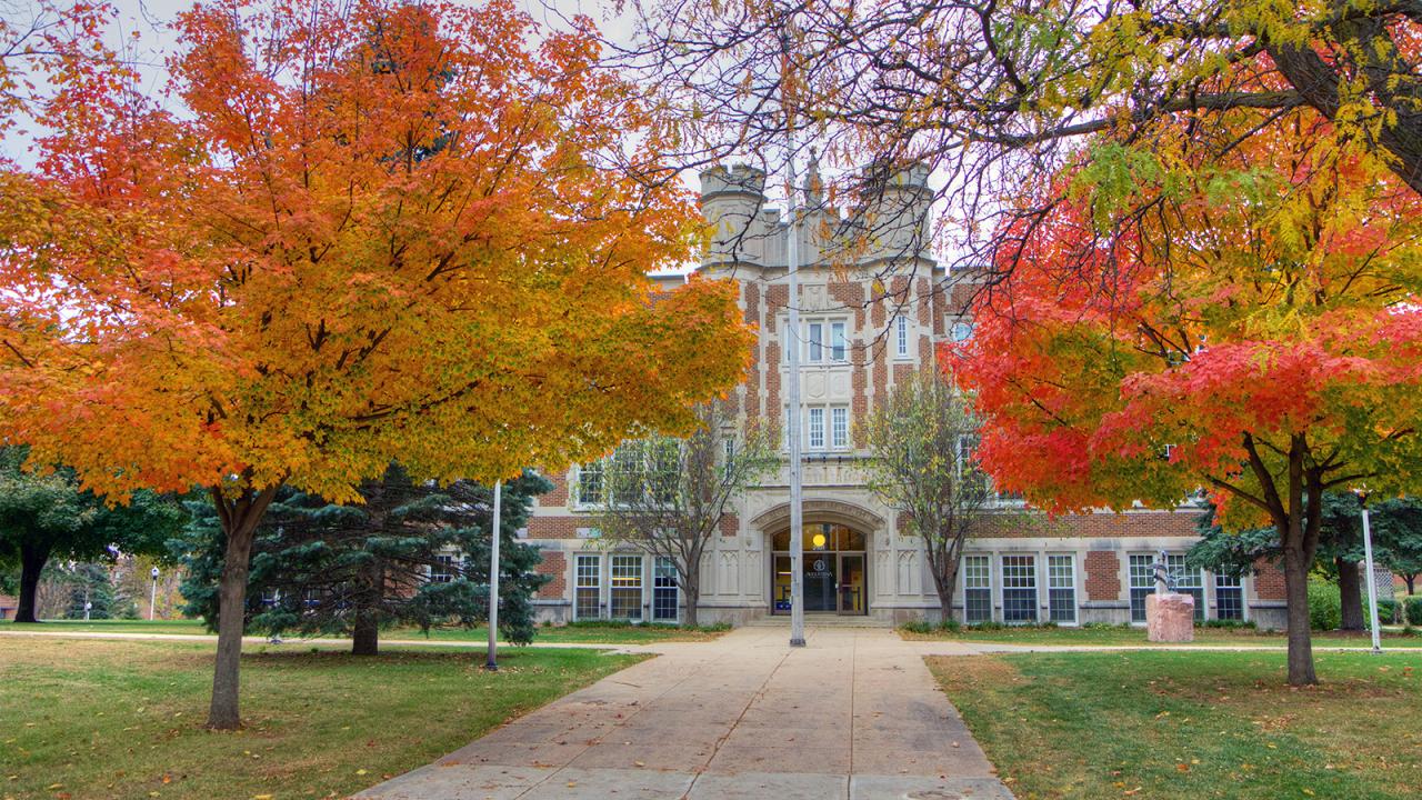 Exterior photo Augustana administration building in the fall