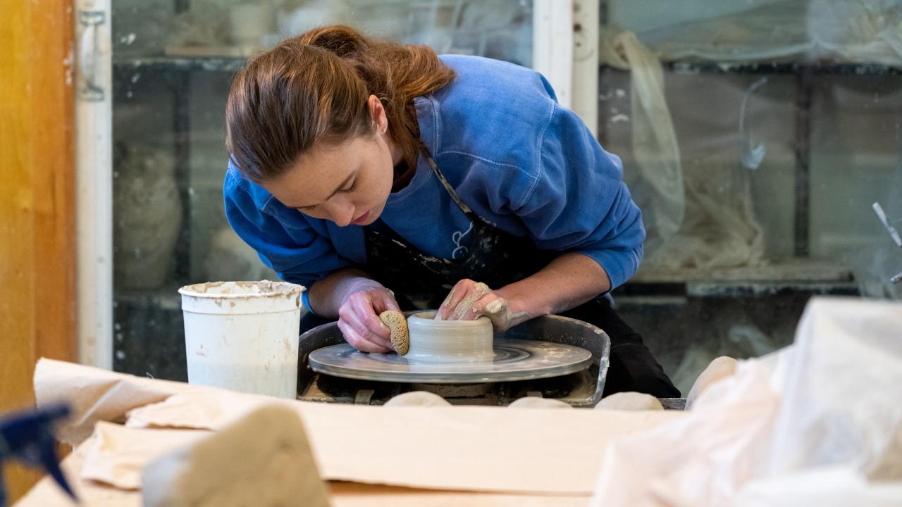 Augustana ceramics student 