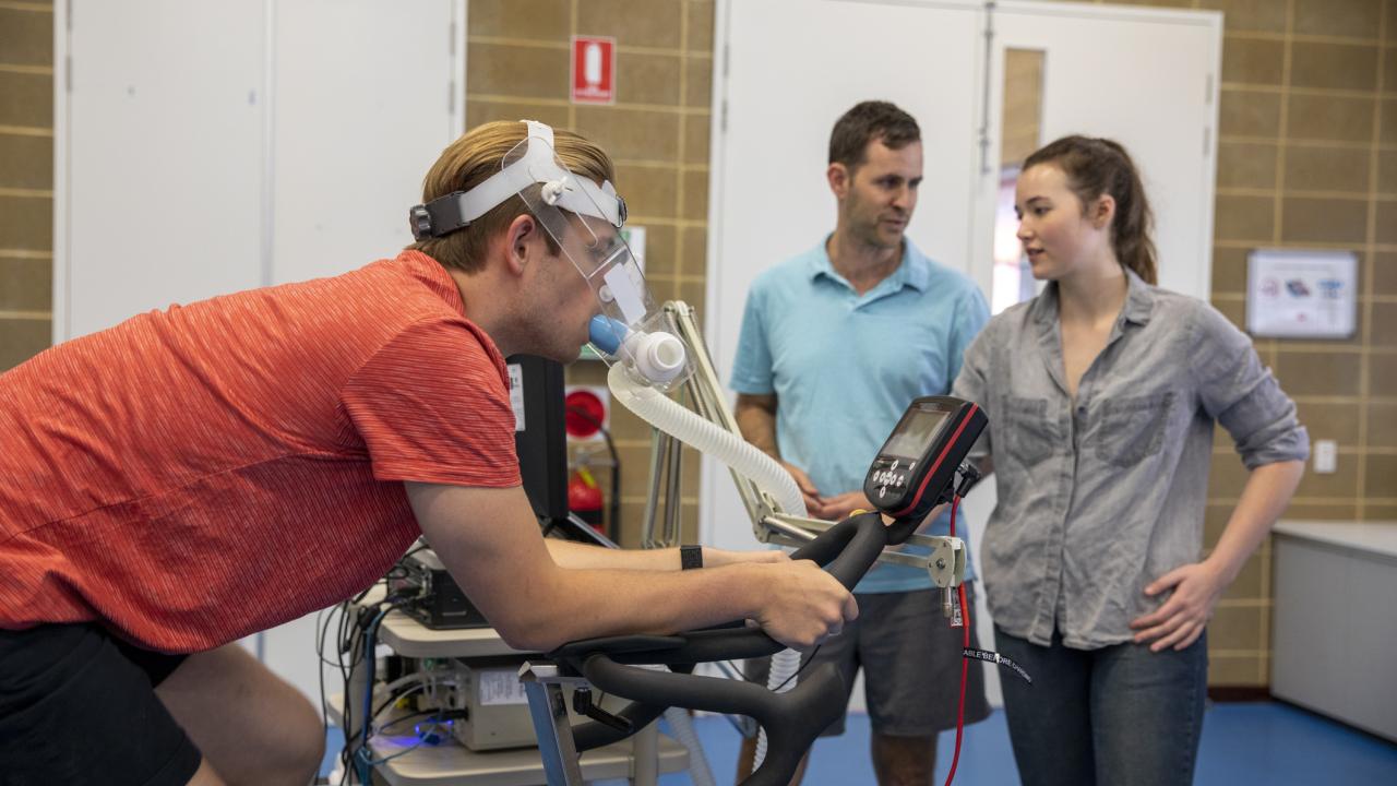 Person riding a stationary bike