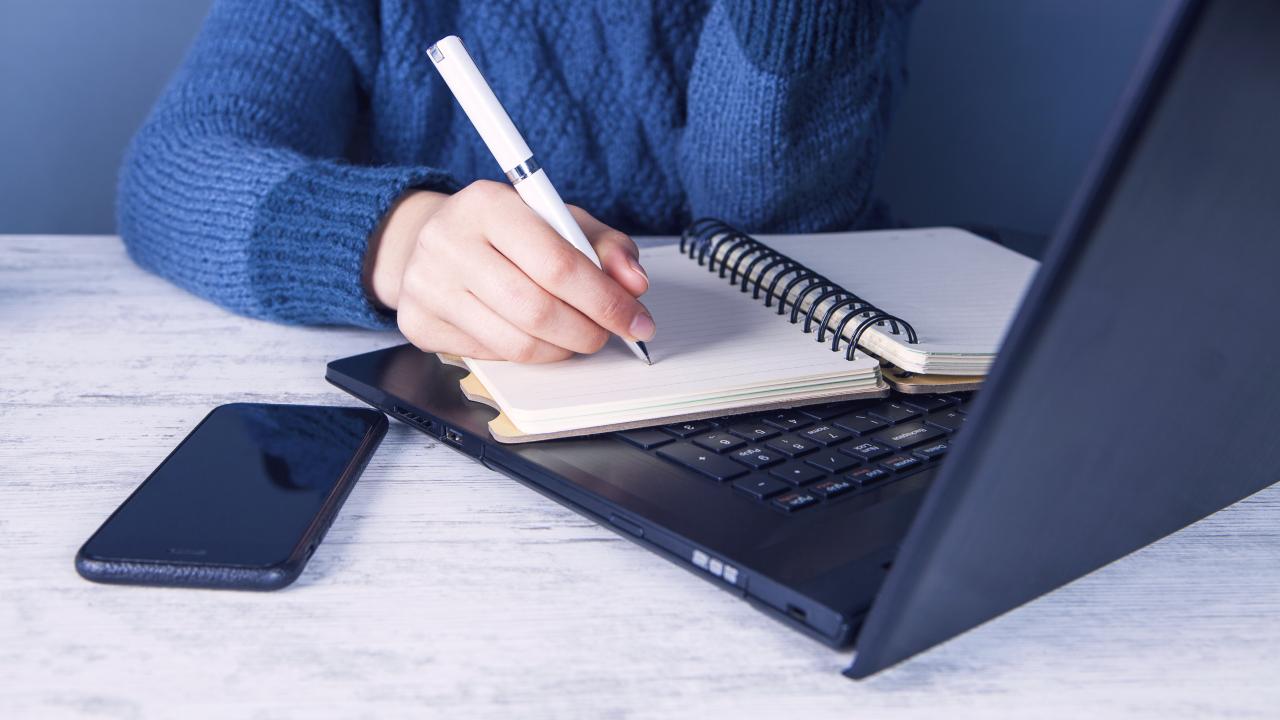 Student at Computer iStock