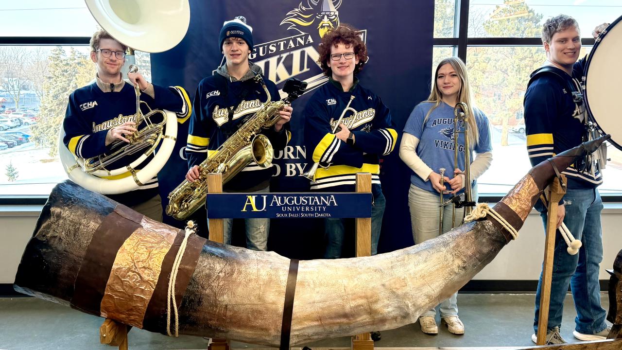 Hockey Band Posing With Ship Facade