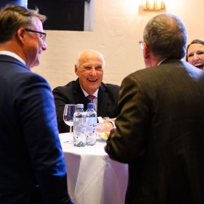 King Speaking With University Members