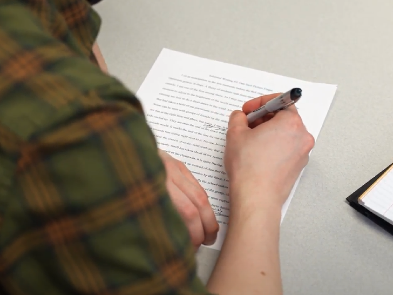 student reviewing a paper