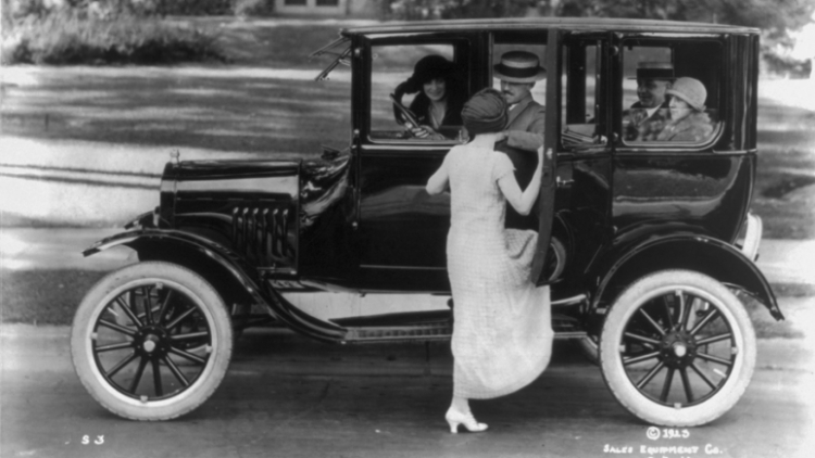 Stepping out on the town in a new Ford sedan. Courtesy Library of Congress.