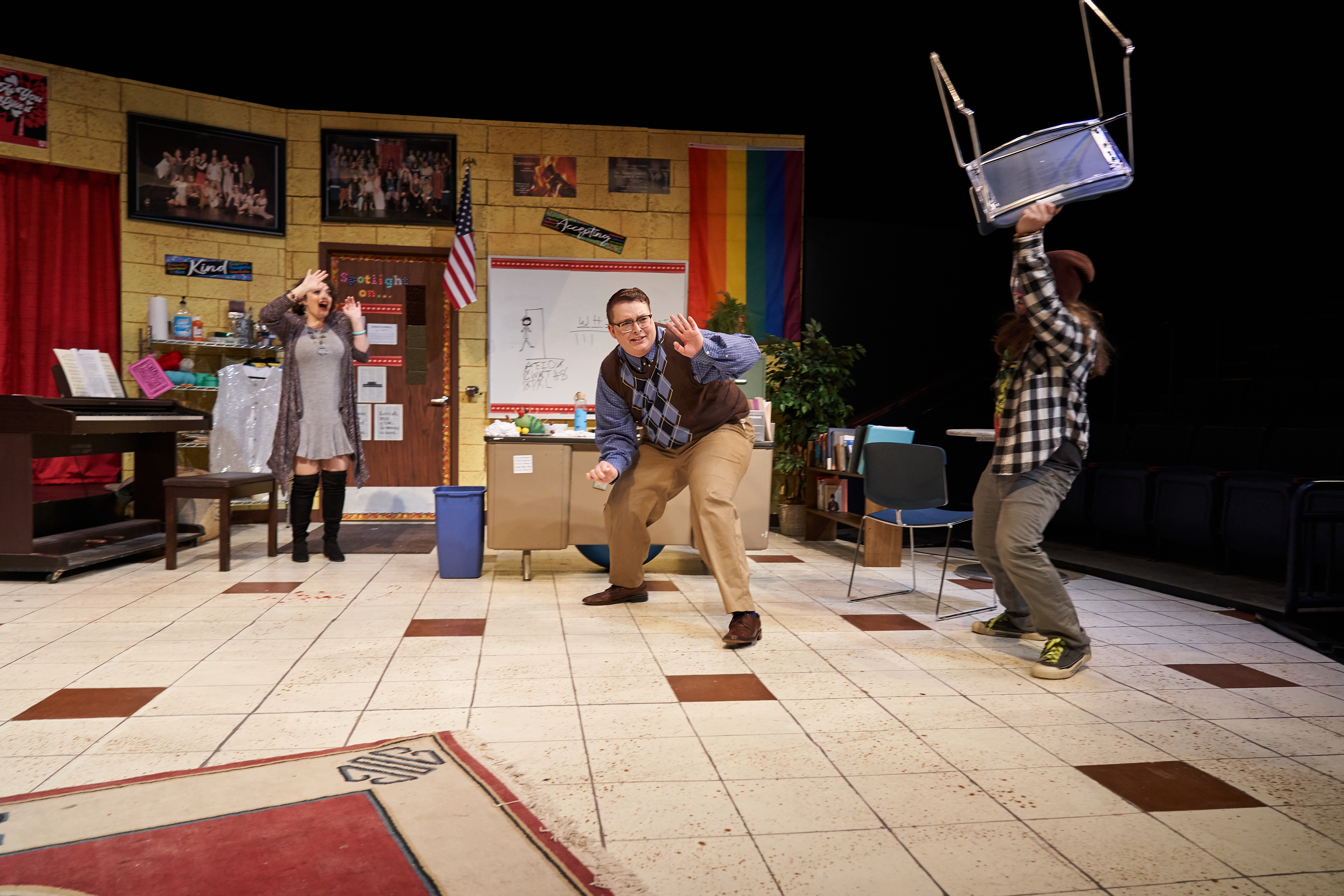 Students perform at play on stage at Augustana University